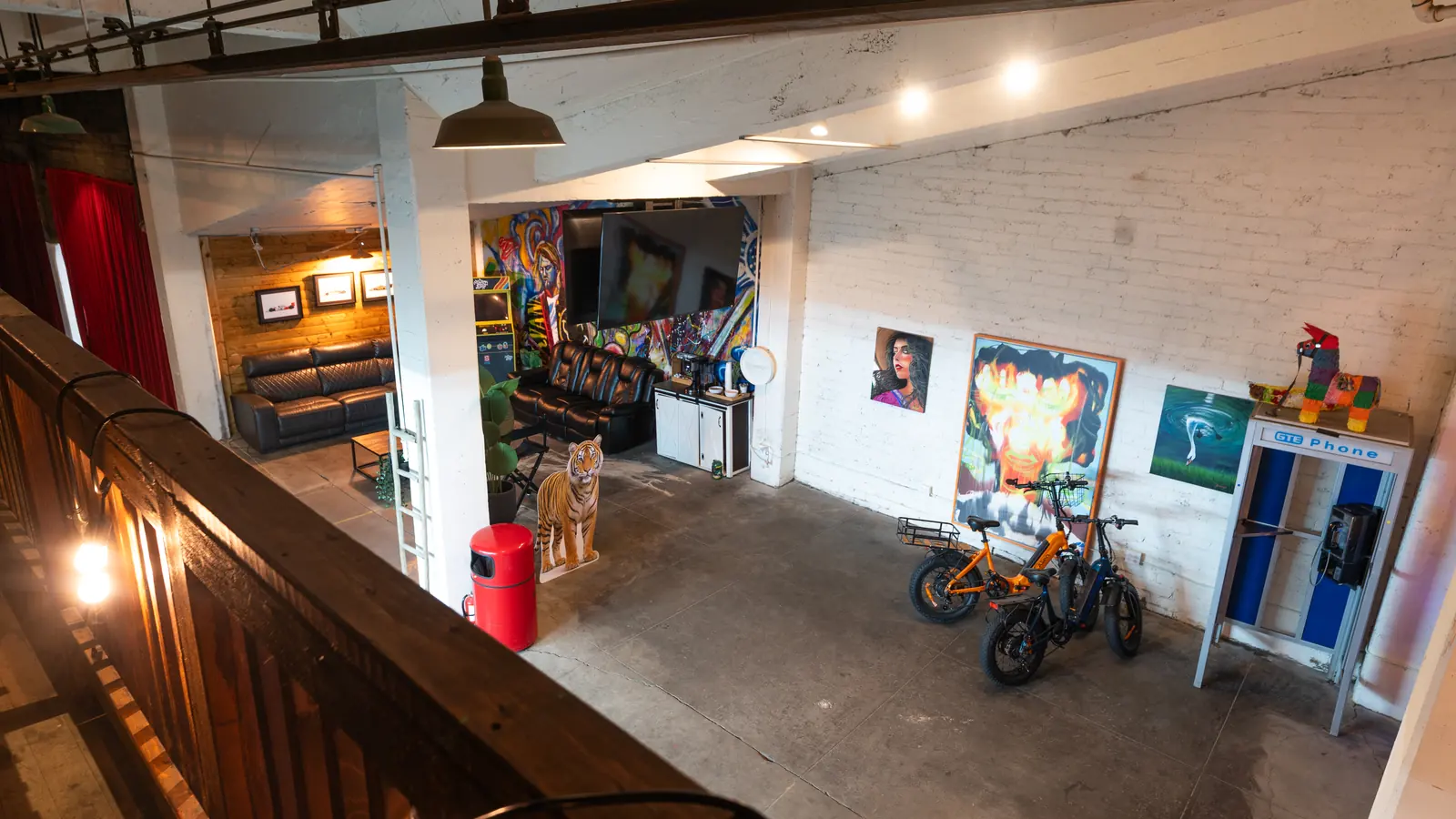 The Back Venue seen from the Speakeasy balcony at 1712 Studios, white brick and the lounge below