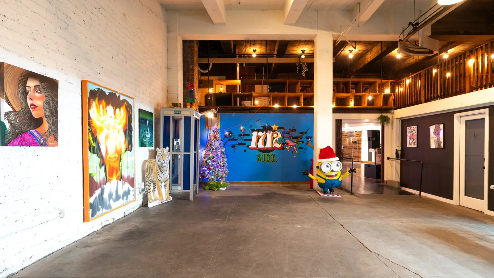 The Back Venue at 1712 Studios: white brick, double height ceilings, original art and the blue 1712 mural