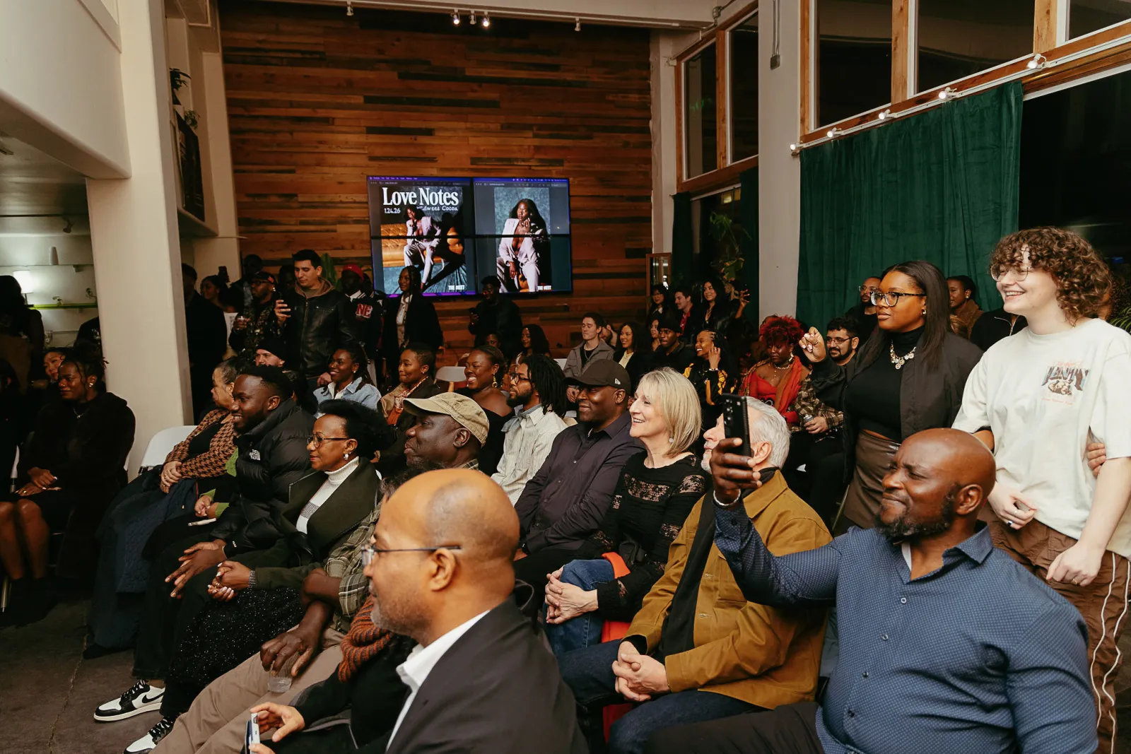 A full audience at a live show in the Main Hall at 1712 Studios